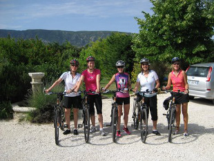 Bikers near fountain.